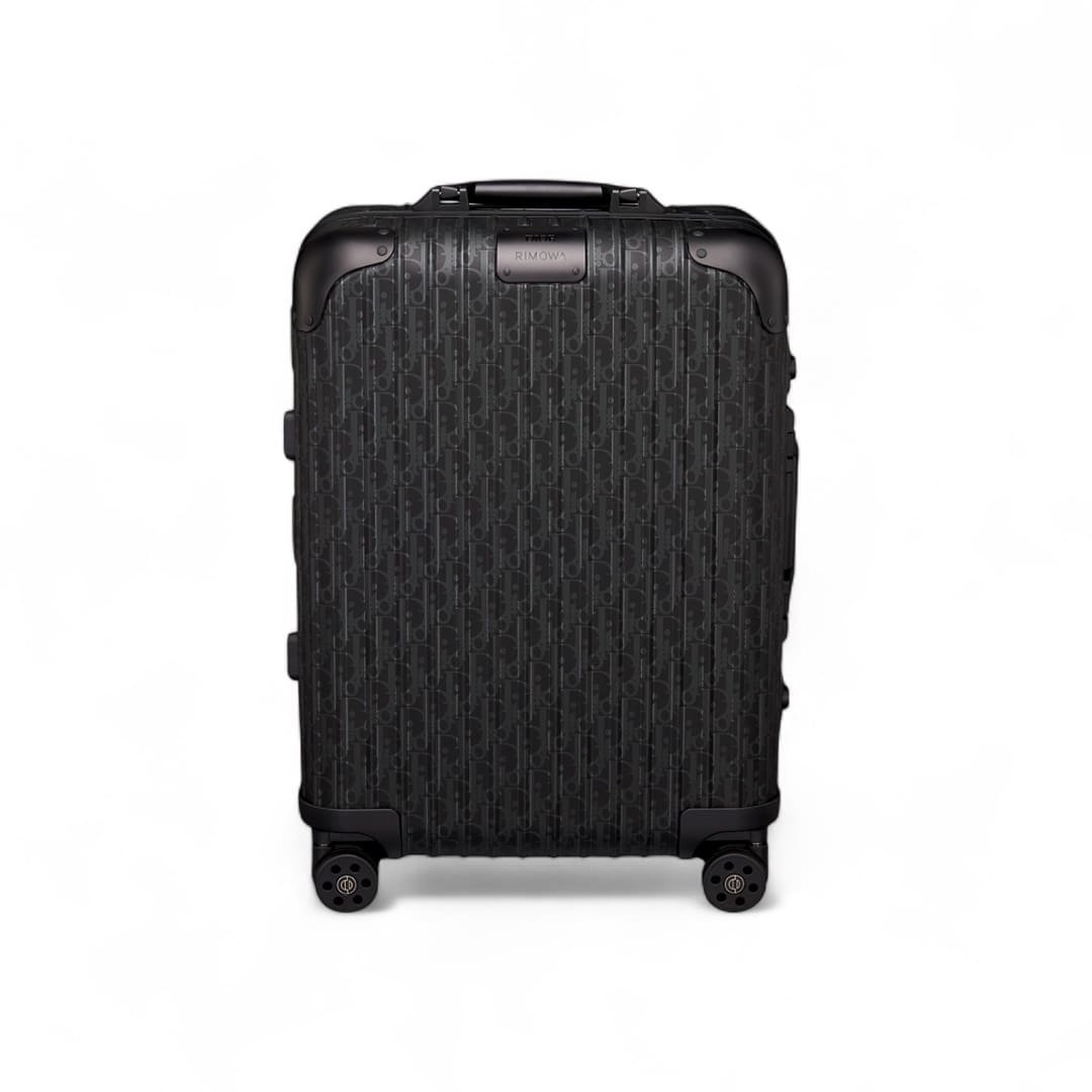 dior and rimowa carry on suitcase